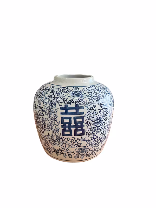 Round white ceramic vase with dense blue floral motifs and a central double happiness Chinese character, wide-bodied with a narrow rim