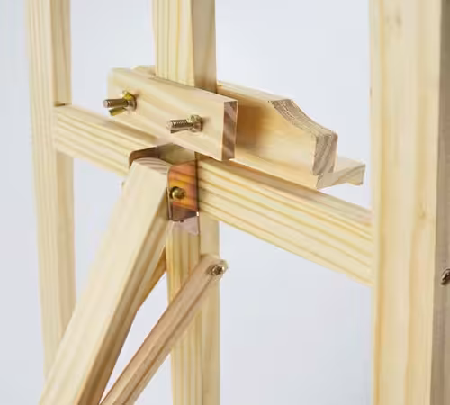 Close-up of the Easel Stand 175 cm adjustable ledge and brass bolt hardware on natural pine wood tripod frame
